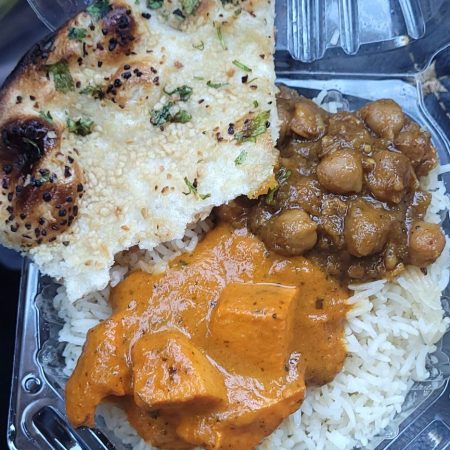 Butter chicken curry with white rice platter
